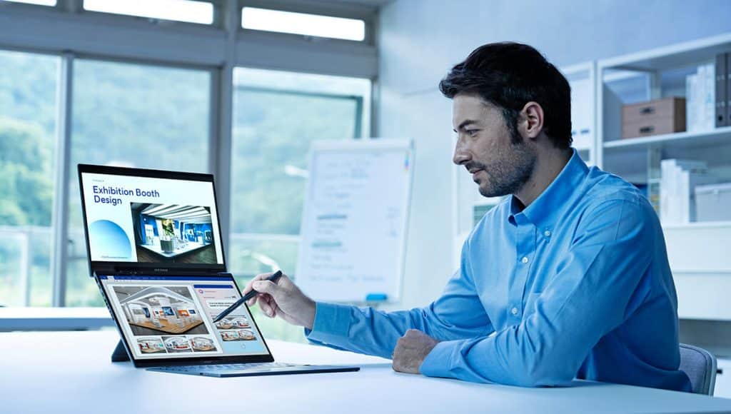 freelancer using ai productivity tools on laptop at desk